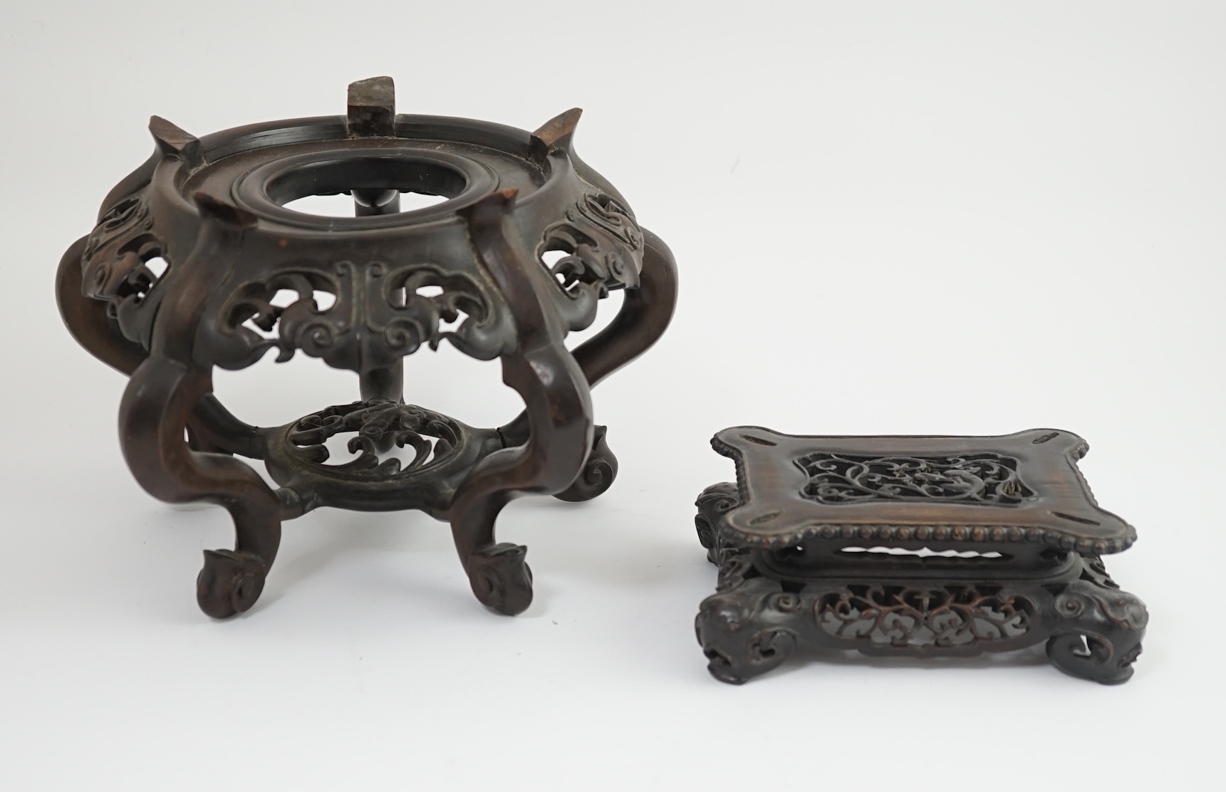 A large Chinese hongmu vase stand and a rectangular hongmu fangding censer stand, late 19th century